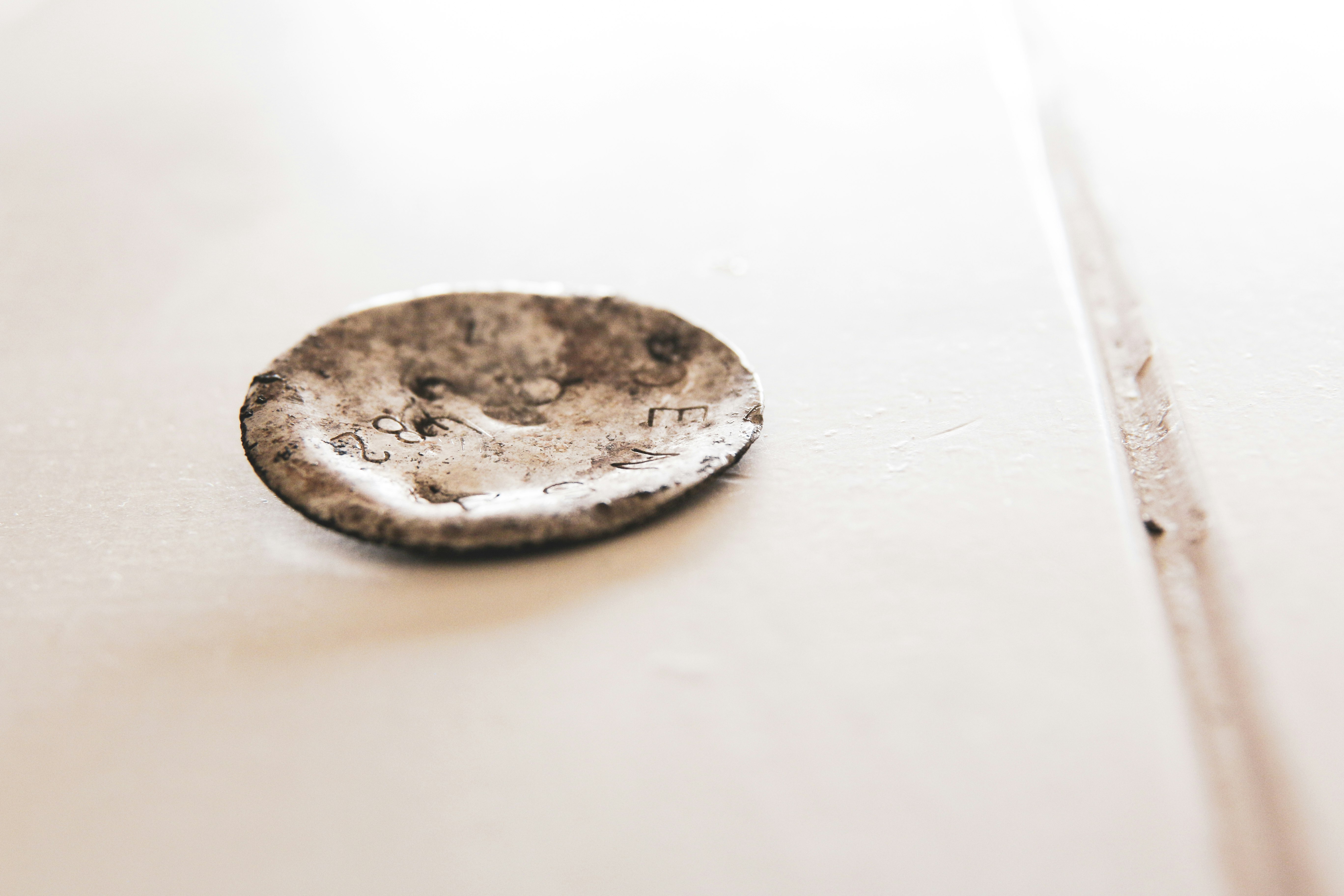 brown round ornament on white surface